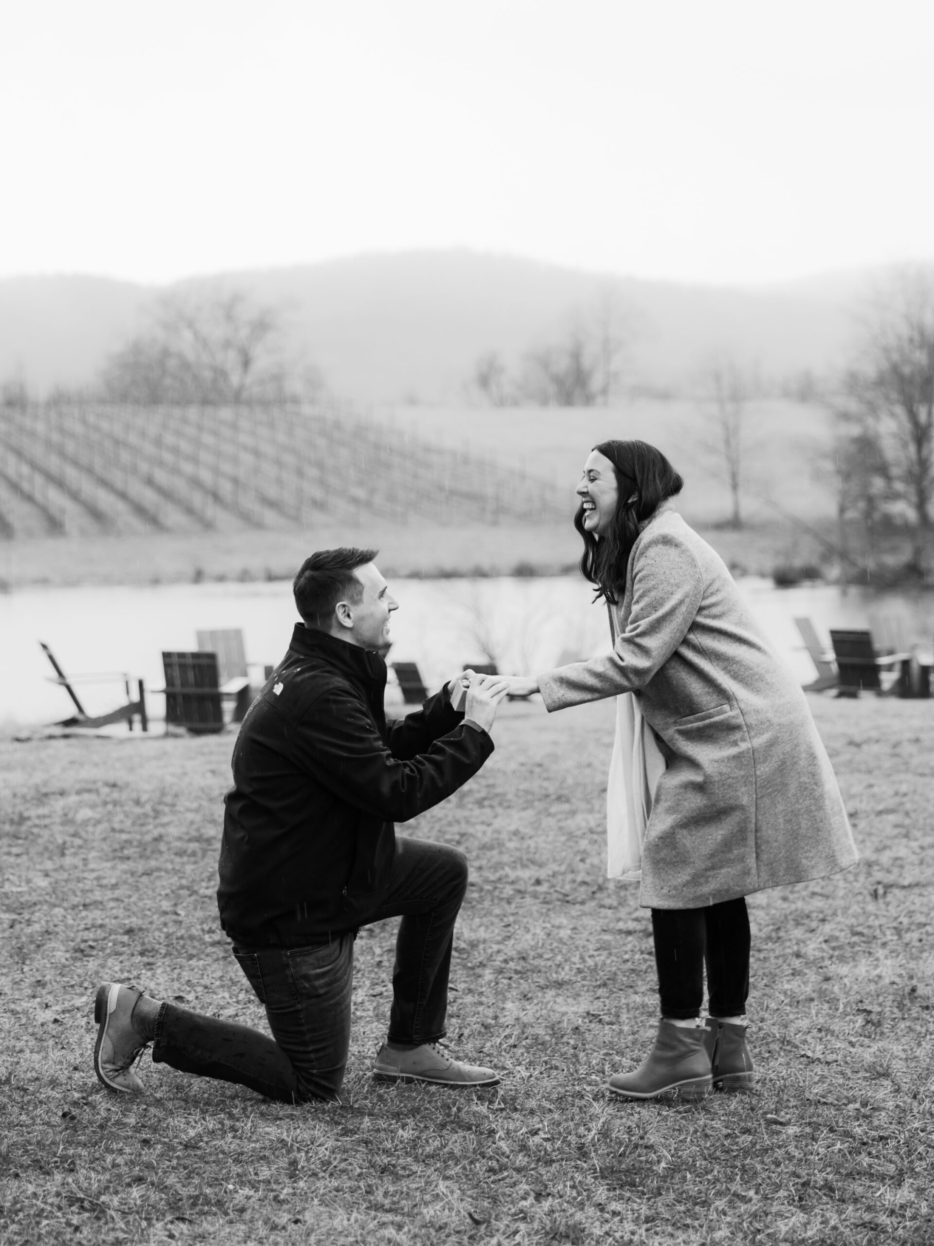 A man proposing to his girlfriend in front of a winery in virginia